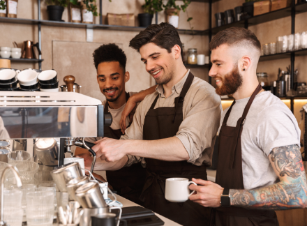 three male baristas